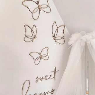 Schmetterlingsset aus Holz mit dem Text „Sweet Dreams“