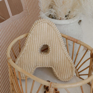 Buchstabenkissen Rippe Sandgelb