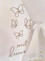 Schmetterlingsset aus Holz mit dem Text „Sweet Dreams“